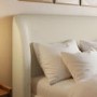 Cream Upholstered King Size Ottoman Bed with Curved Headboard - Adelyn