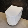 Fluted Wall Hung Rimless Toilet with Soft Close Seat, Matt Black Pneumatic Flush Plate, 820mm Frame & Cistern – Oregon