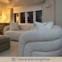 Cream Boucle Left Hand Facing 4 Seater Curved Corner Sofa - Zuri